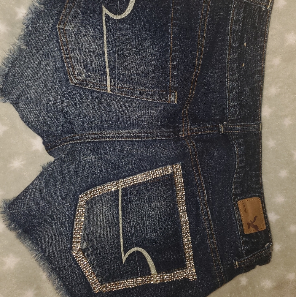 Custom gem studded pocket American Eagle shorts